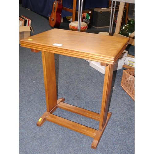 623 - Oak folding occasional table, H53cm.