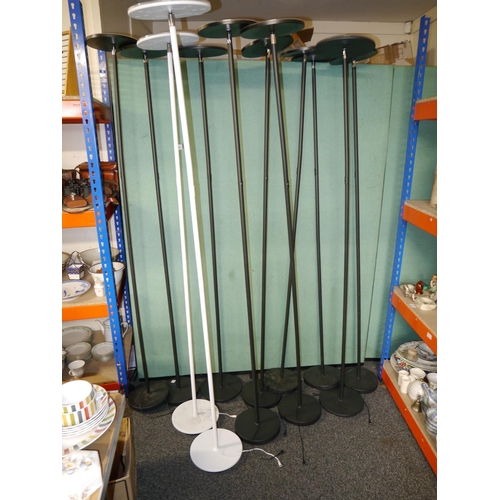 639 - Twelve uplifter standard lamps.