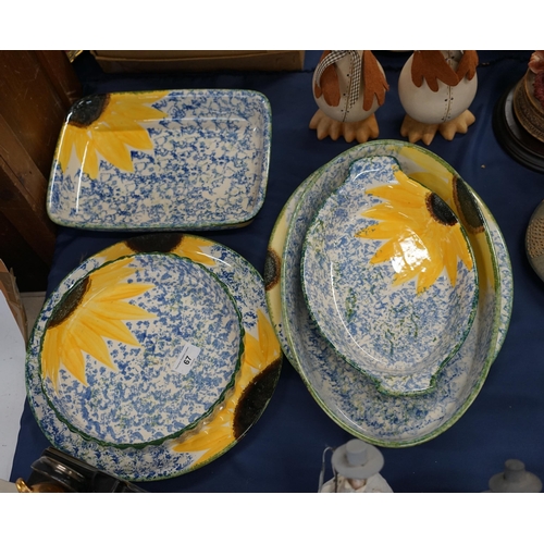 67 - Poole Pottery Vincent Sunflower sponge decorated serving and oven ware to include lasagne and quiche... 