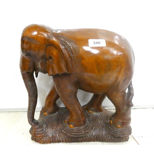 340 - Large treen carved African elephant.