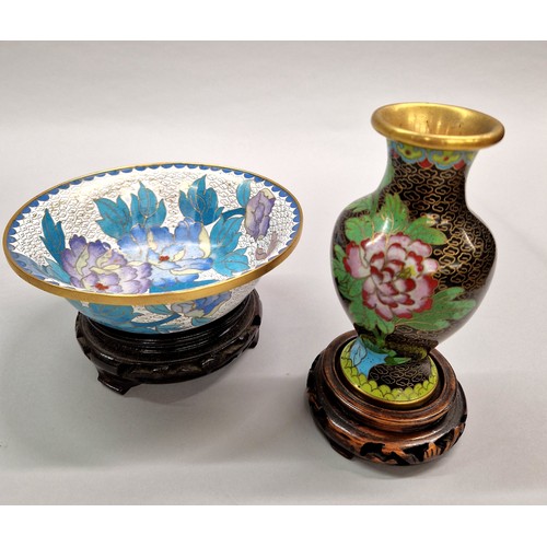 218 - Zi Jin Cheng 20th century cloisonne vase and a cloisonne bowl, both with wooden stands