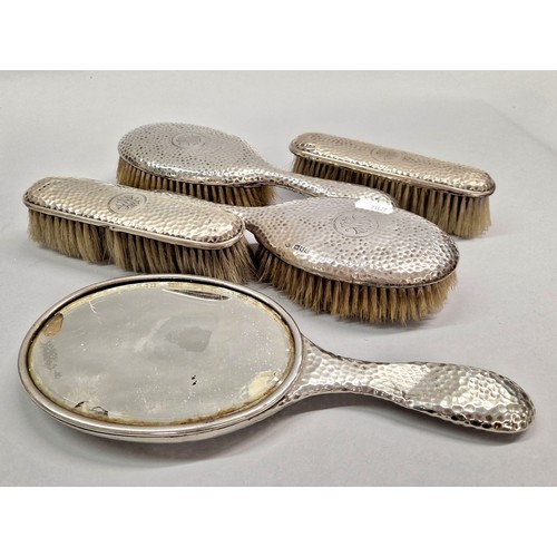 223 - Silver five piece vanity set with hammered design, London 1904