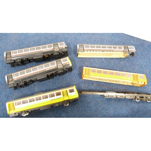 10 - Two cartons containing rolling stock parts, wheels, locos, DMUs etc.