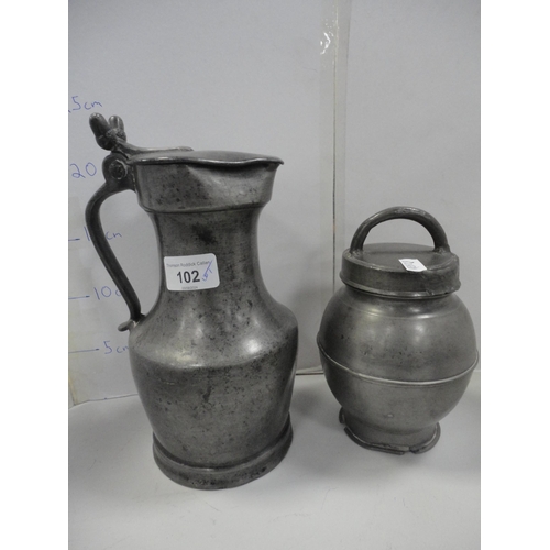 102 - Group of antique pewter to include tappit hen, jug, candlesticks, plate, tankard and a cruisie lamp ... 