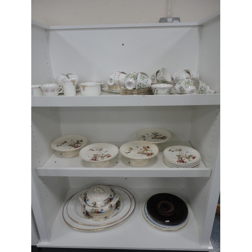 107 - Colclough and other part tea sets, part fruit set, ashets, tureen, plates etc (three shelves).