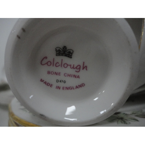 107 - Colclough and other part tea sets, part fruit set, ashets, tureen, plates etc (three shelves).