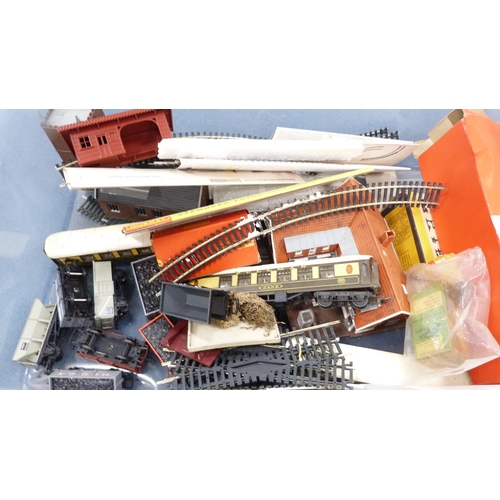 12 - Carton containing boxed Tri-ang R.407 hand-operated turntable, Hornby 00 gauge coaches to include tw... 