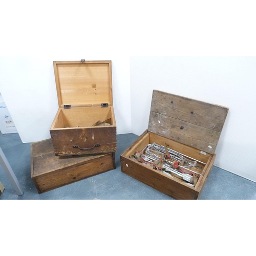 183 - Two wooden crates containing Gipron roller skates, also tools, chisels etc., and another empty crate... 