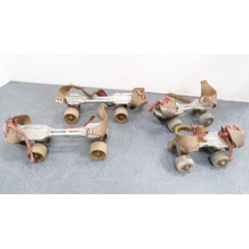 183 - Two wooden crates containing Gipron roller skates, also tools, chisels etc., and another empty crate... 