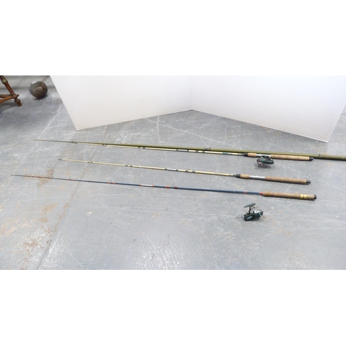 186 - Group of fishing rods and spinning reels.