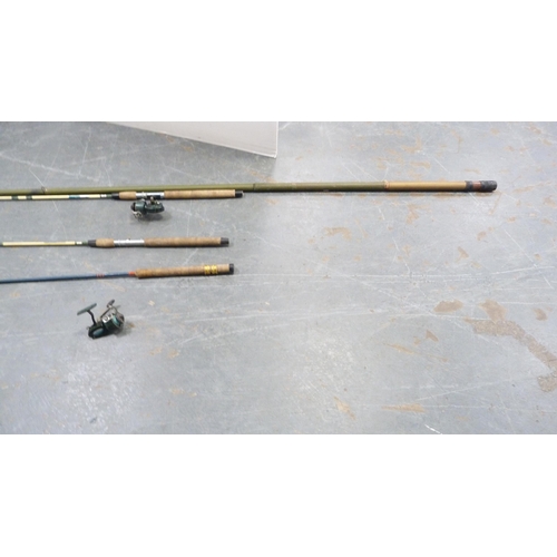 186 - Group of fishing rods and spinning reels.