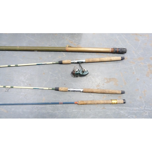 186 - Group of fishing rods and spinning reels.