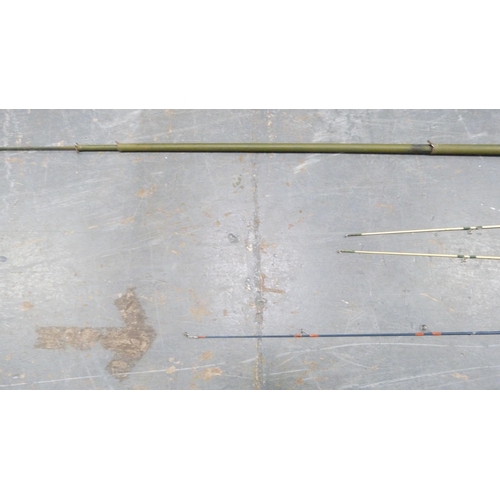 186 - Group of fishing rods and spinning reels.