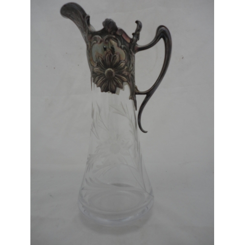 188 - Art Nouveau-style cut glass jug with plated embossed mount and handle