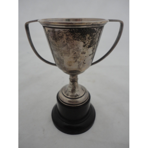 191 - Silver-mounted butter dish with glass insert, silver napkin ring and a small silver prize cup, silve... 