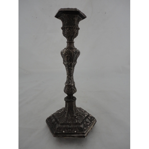 192 - Converted antique silver embossed candlestick with loaded base.