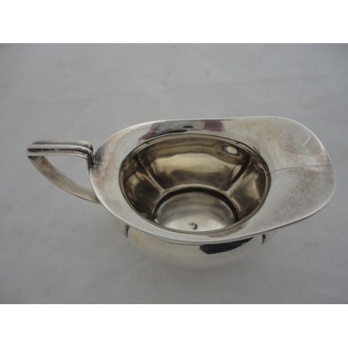 194 - Silver cream jug, 80g.