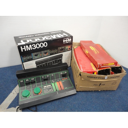 20 - Carton containing Hornby 00 gauge track and Tri-ang 00 gauge track, two HM3000 power control centres... 