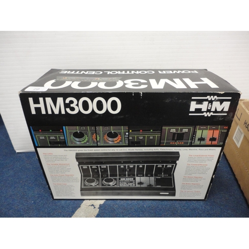 20 - Carton containing Hornby 00 gauge track and Tri-ang 00 gauge track, two HM3000 power control centres... 