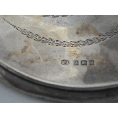 202 - Silver-backed four-piece dressing table set in fitted box.