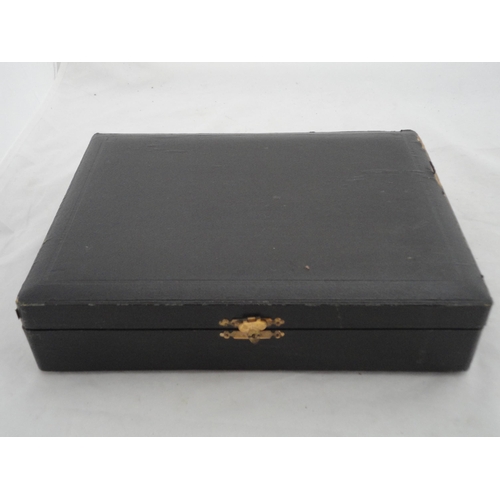 202 - Silver-backed four-piece dressing table set in fitted box.