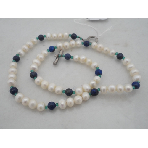 207 - Cultured pearl necklace interspersed with lapis-type stones, a pair of pearl earrings, a 9ct gold ea... 