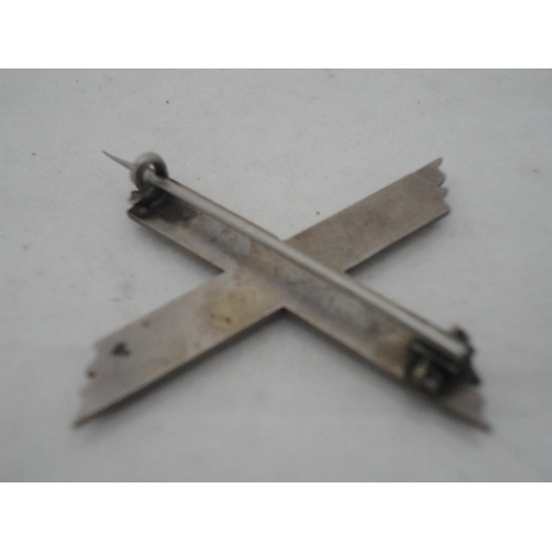 210 - Silver bangle and a child's silver bangle, 30g gross, also a marquis-shaped cocktail ring on silver ... 