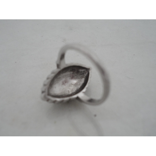 210 - Silver bangle and a child's silver bangle, 30g gross, also a marquis-shaped cocktail ring on silver ... 