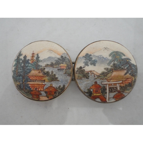 211 - Pair of Japanese Satsuma buckles and a Japanese gilt metal buckle.&nbsp; (3)