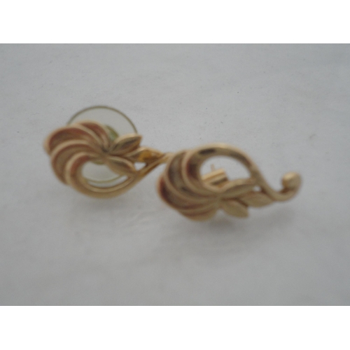 212 - Pair of 9ct gold earrings, 7g gross, and a pair of yellow metal earrings.