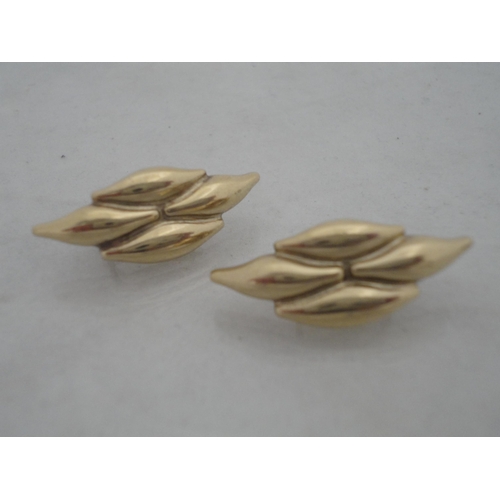 212 - Pair of 9ct gold earrings, 7g gross, and a pair of yellow metal earrings.