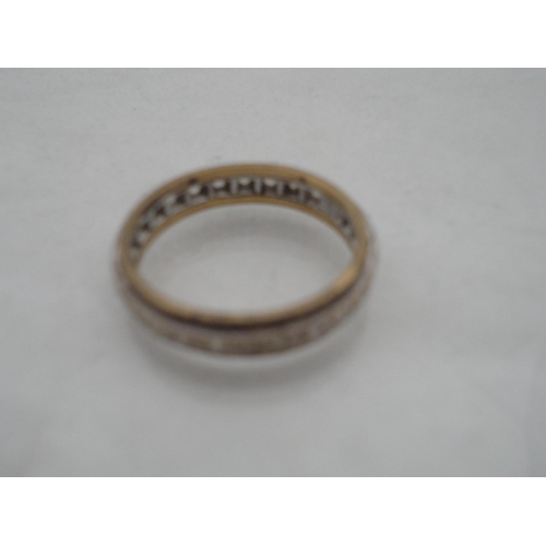 220 - 9ct gold eternity ring, 3.3g gross.