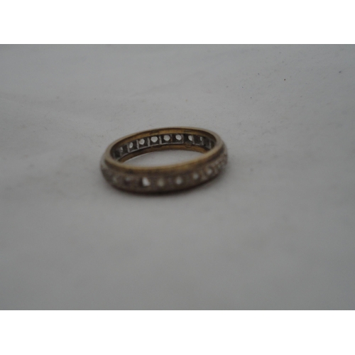 220 - 9ct gold eternity ring, 3.3g gross.