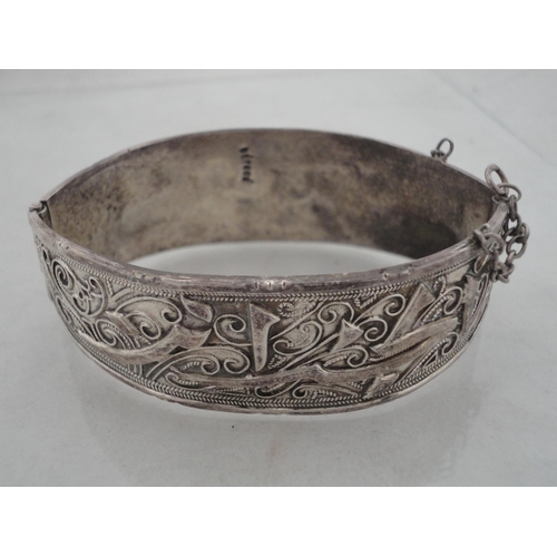 222 - Silver engine-turned vesta holder, 39g, white metal bangle and a cased silver-mounted cheroot holder... 