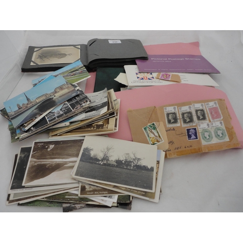 230 - Collection of postcards, both loose and contained in an album, to include military-related and vinta... 