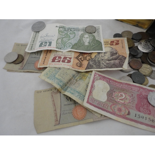 231 - Collection of world banknotes and coinage, contained in a tin.