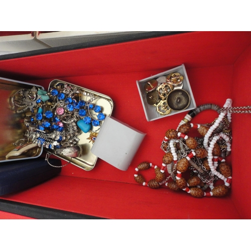 234 - Two jewellery boxes containing a large collection of costume jewellery and watches.