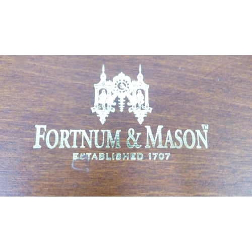 240 - Fortnum & Mason box containing a rugby ball, collector's box and a bottle rack etc.