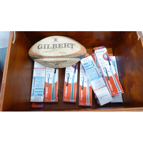 240 - Fortnum & Mason box containing a rugby ball, collector's box and a bottle rack etc.