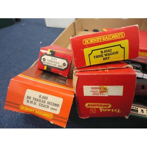 26 - Carton containing 00 gauge coaches and rolling stock to include a boxed Hornby R.267 two car DMU cla... 