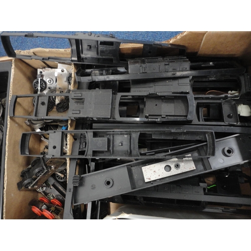 28 - Two cartons containing 00 gauge rolling stock, parts, accessories etc.