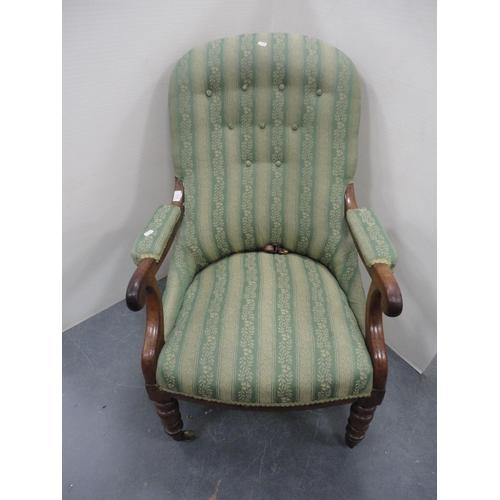 283 - Victorian mahogany framed open armchair on brass castors.