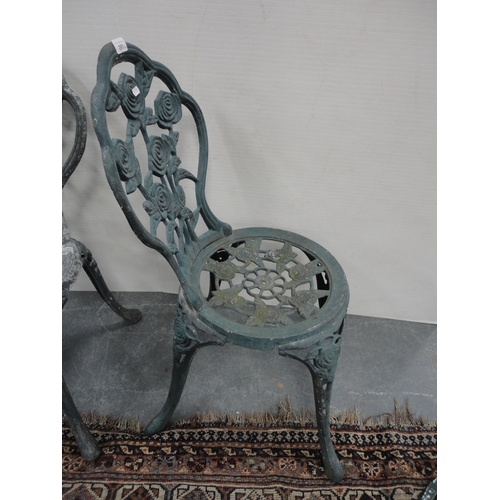 291 - Three matching reproduction Coalbrookdale-style garden chairs, painted in green.  (3)