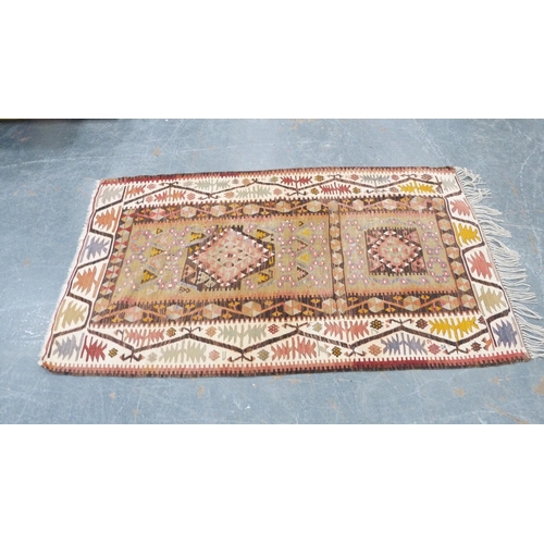 294 - Turkish nomadic multi-coloured rug with all over geometric decoration.