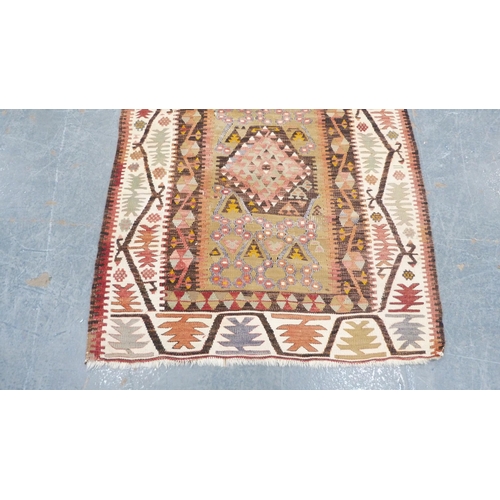 294 - Turkish nomadic multi-coloured rug with all over geometric decoration.