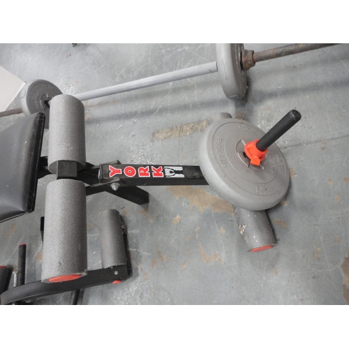 York 6600 bench press with various weights