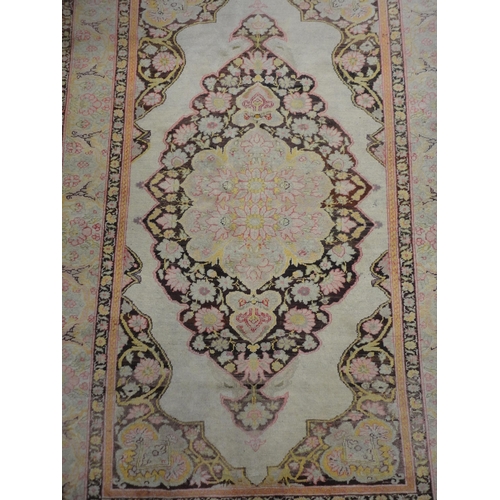 299 - Persian Tabriz design hand-knotted rug.