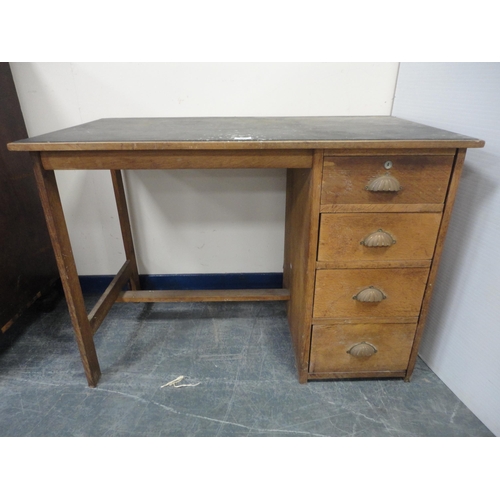 302 - Vintage oak desk with four drawers to one side.