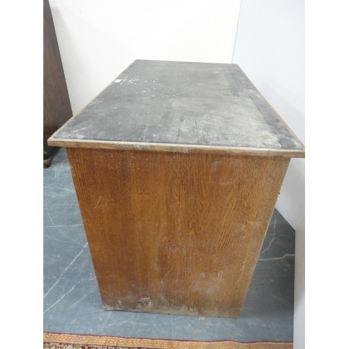 302 - Vintage oak desk with four drawers to one side.