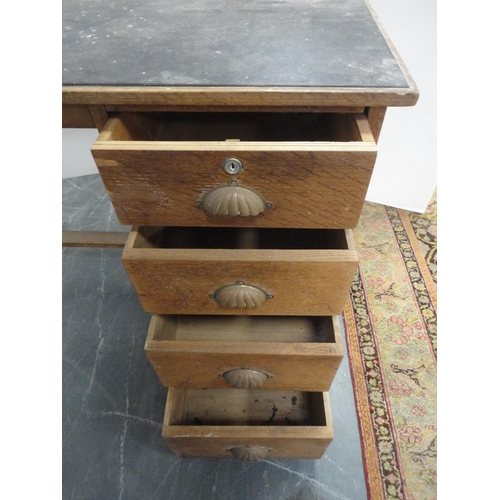 302 - Vintage oak desk with four drawers to one side.